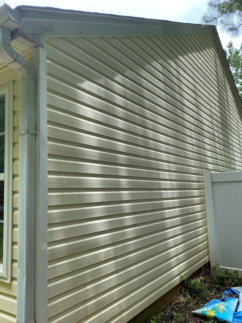 Professional pressure washing equipment and clean surfaces